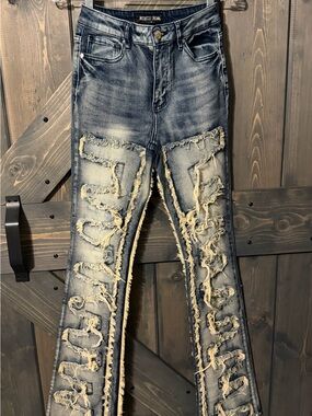 Rockstar Original Zariyah Stacked Tinted Dark wash Flare Jeans